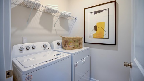 laundry room with shelfs