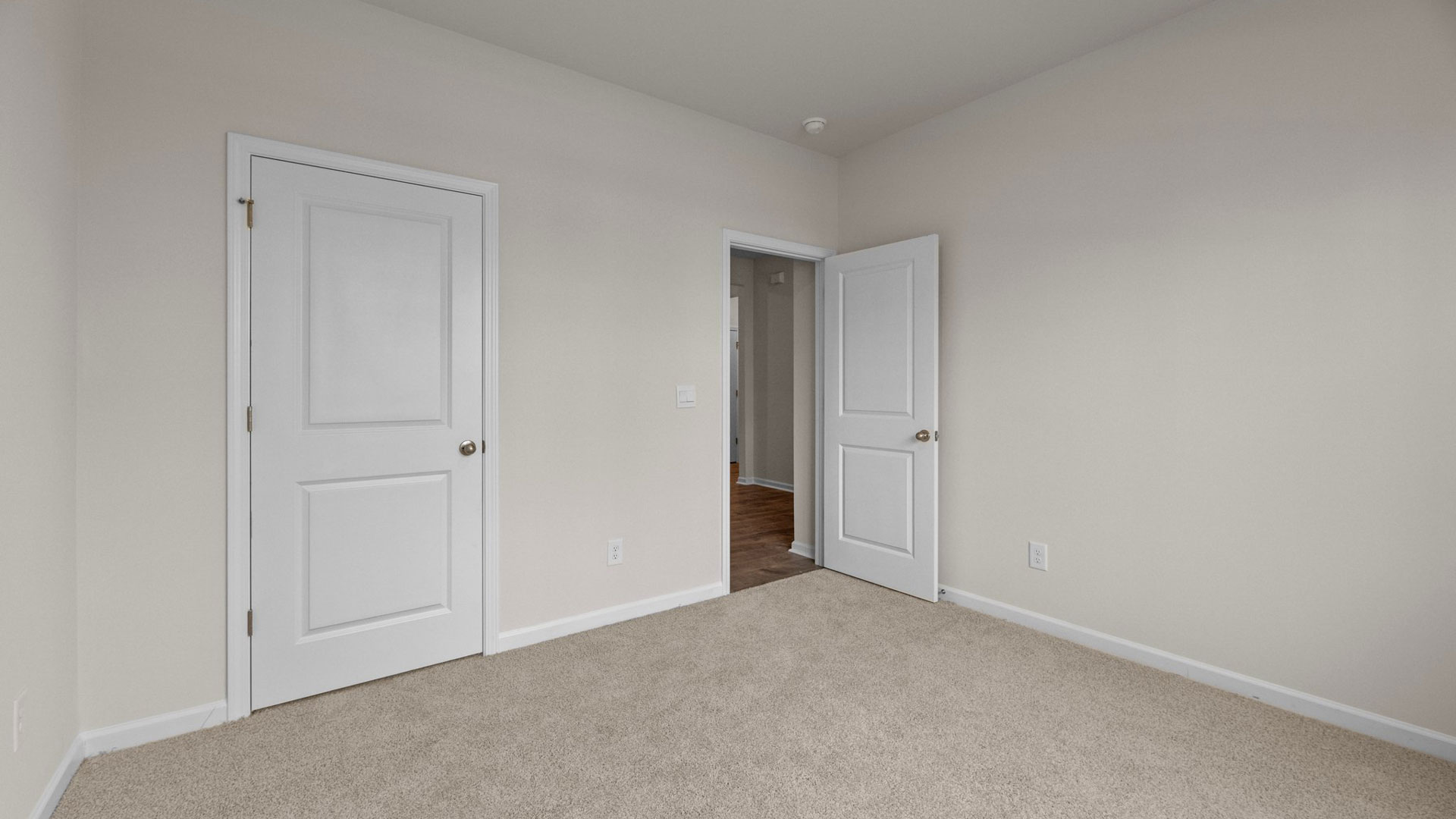 Secondary Bedroom with carpet