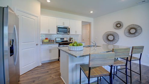 Kitchen with Island and revwood floor