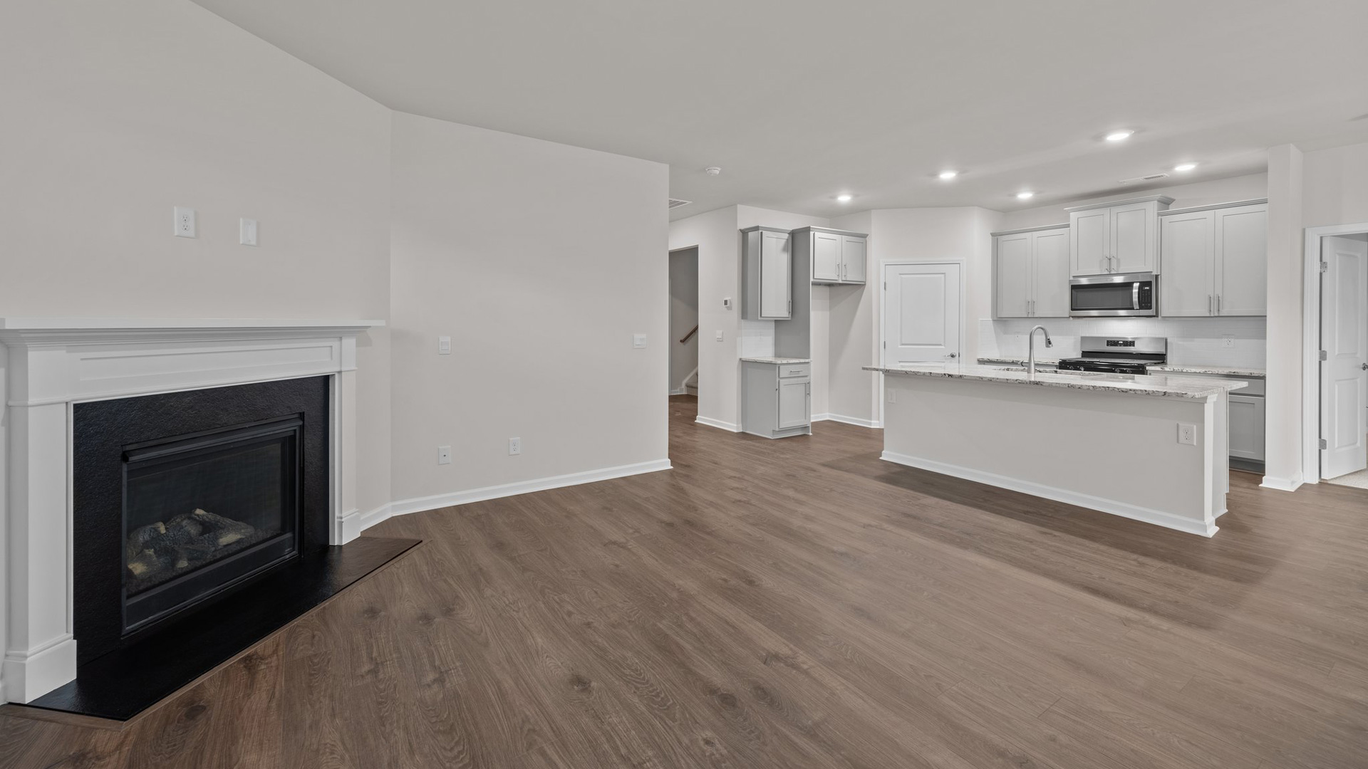 living with partial kitchen view