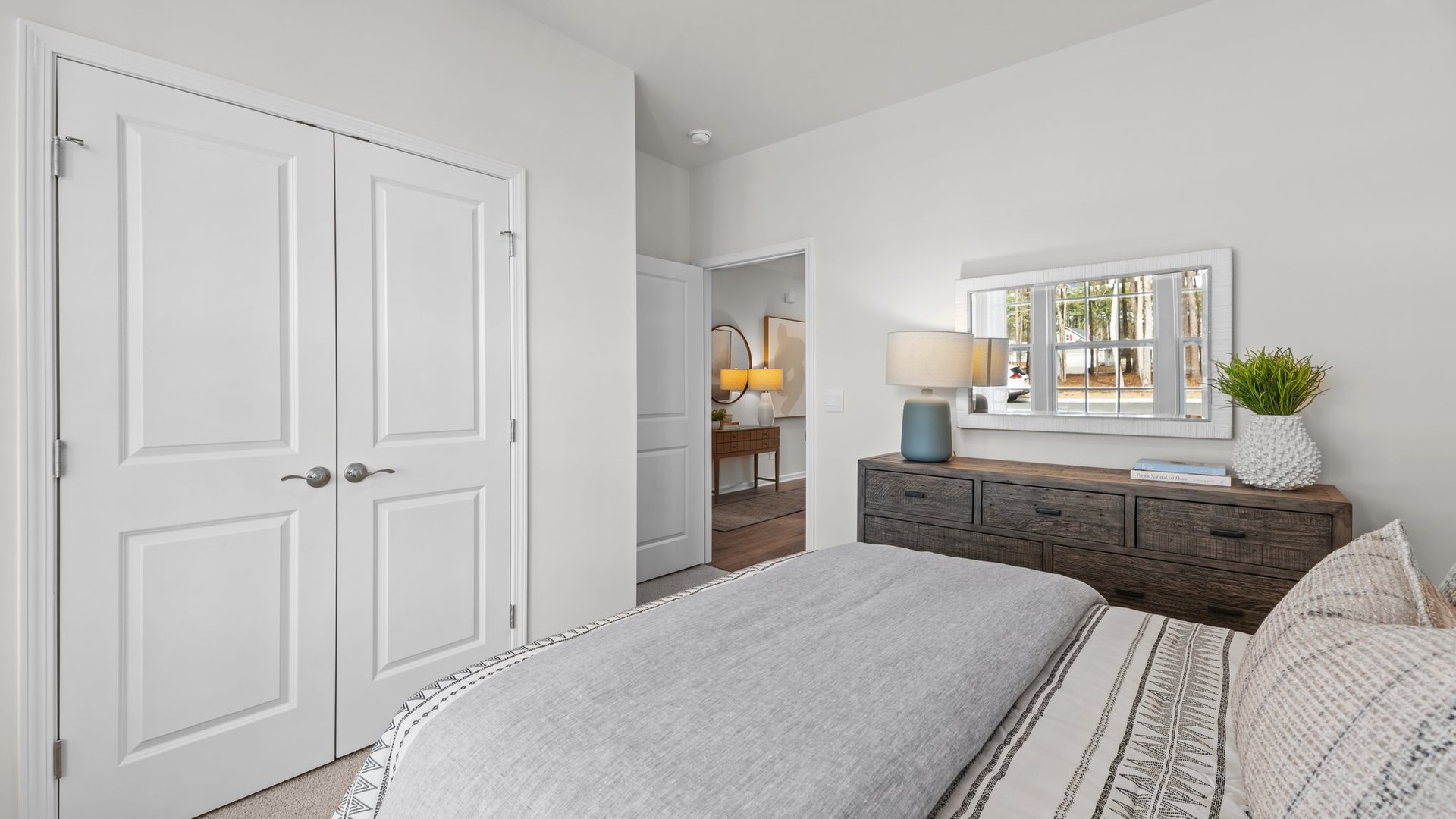 bedroom looking at the closet door