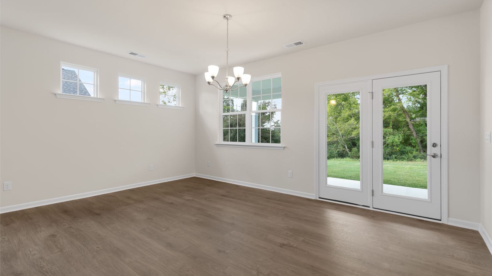 dining room area with sliding door view