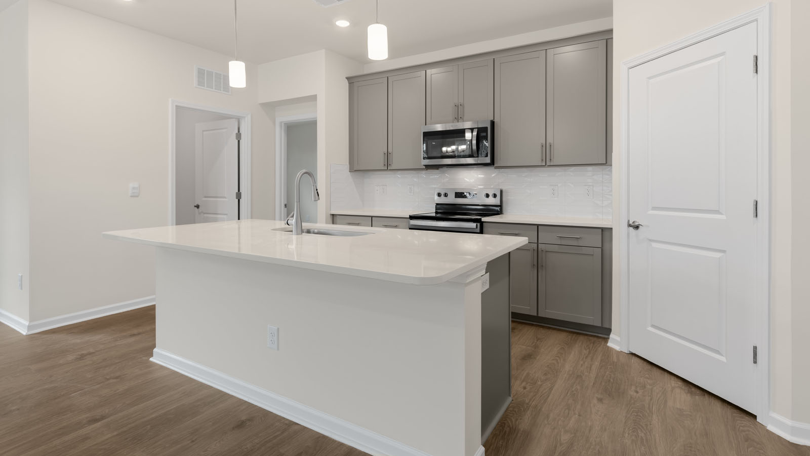 kitchen island and white cabinets