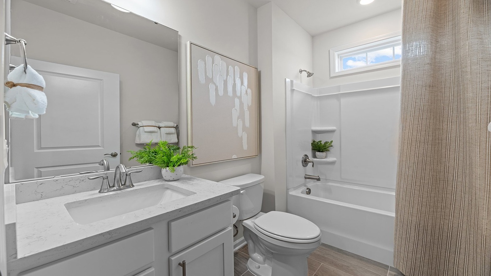 bathroom with tub shower combo