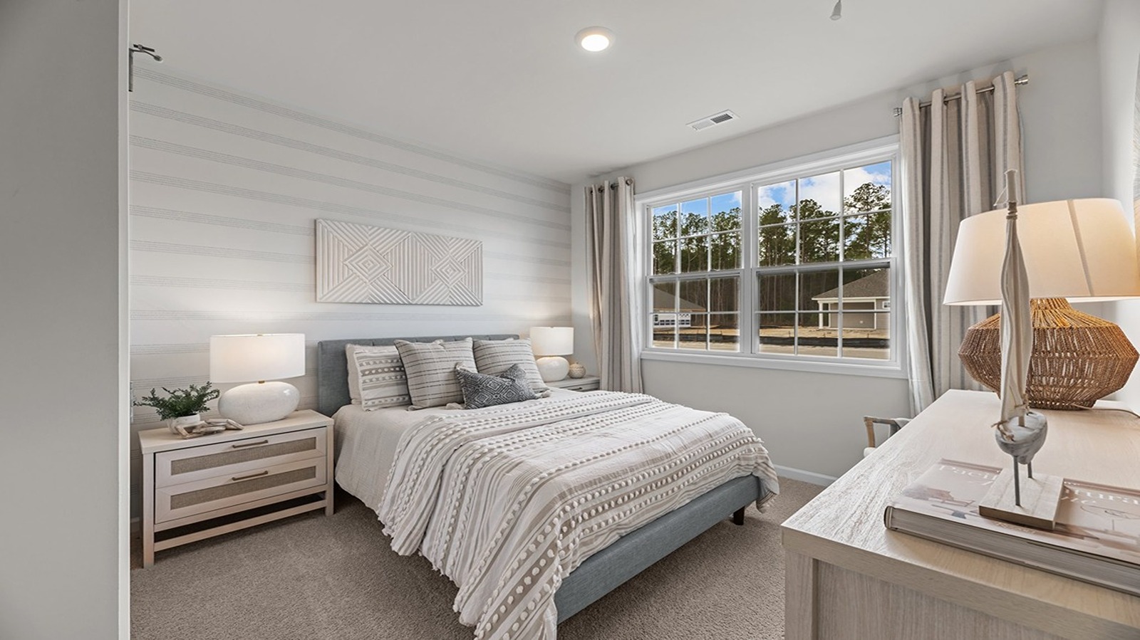 bedroom with carpet flooring and double window