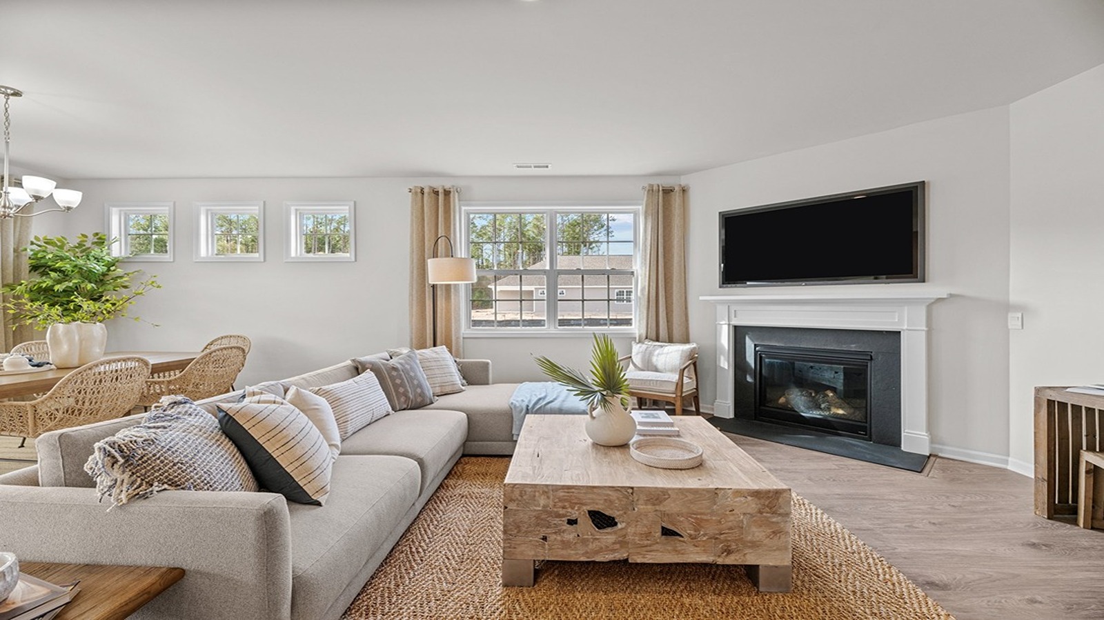 living room open to kitchen and dining area