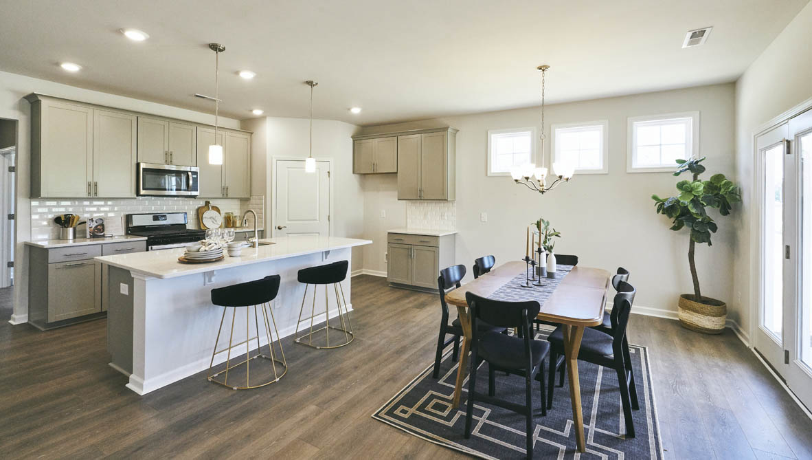 kitchen with island and revwood floor