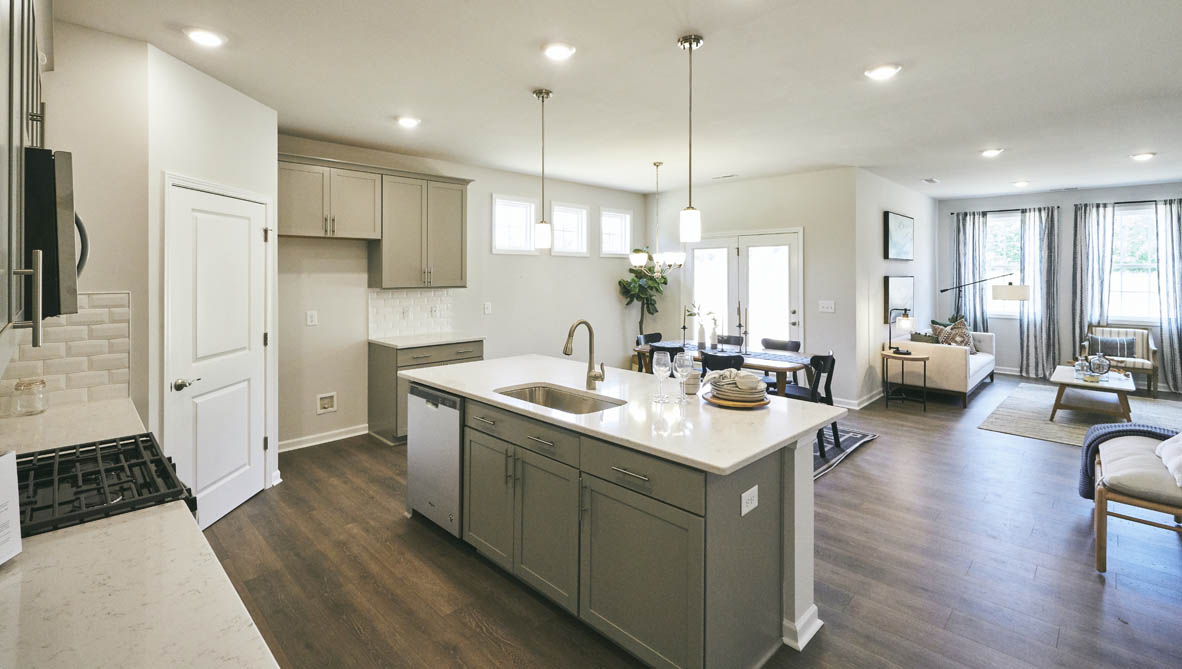 kitchen with island and revwood floor