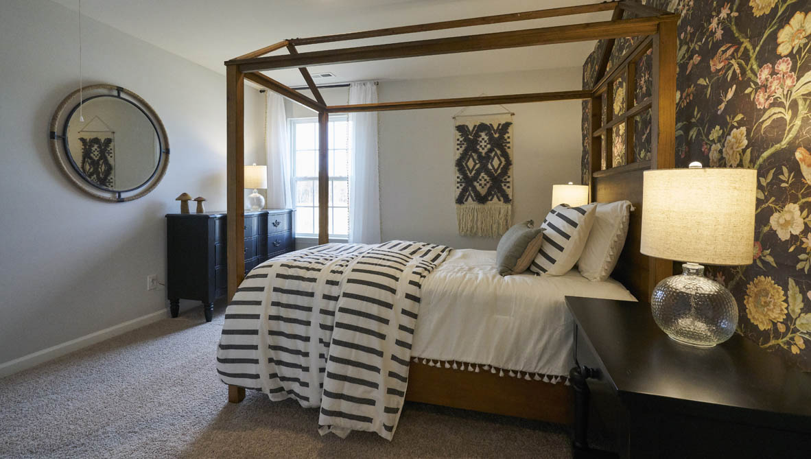 bedroom with carpet and natural light