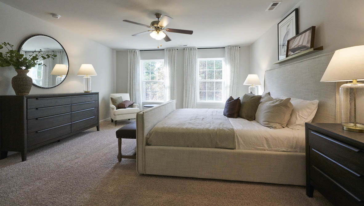 bedroom with carpet and natural light