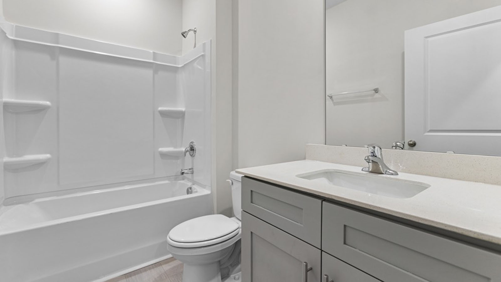 bathroom with tub shower combo