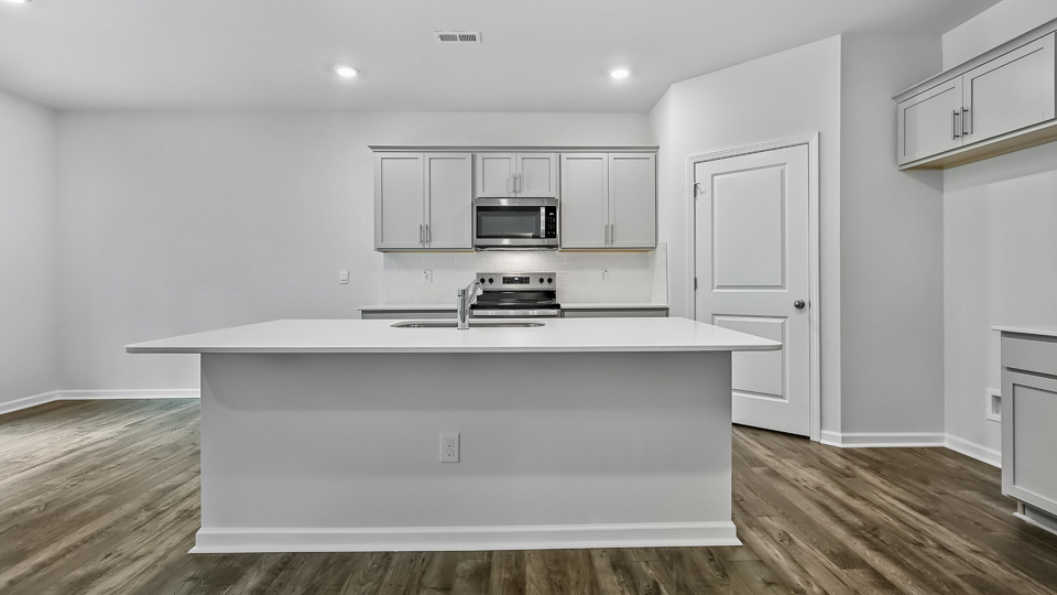 kitchen with white cabinets