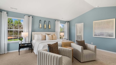 bedroom with carpet and natural light