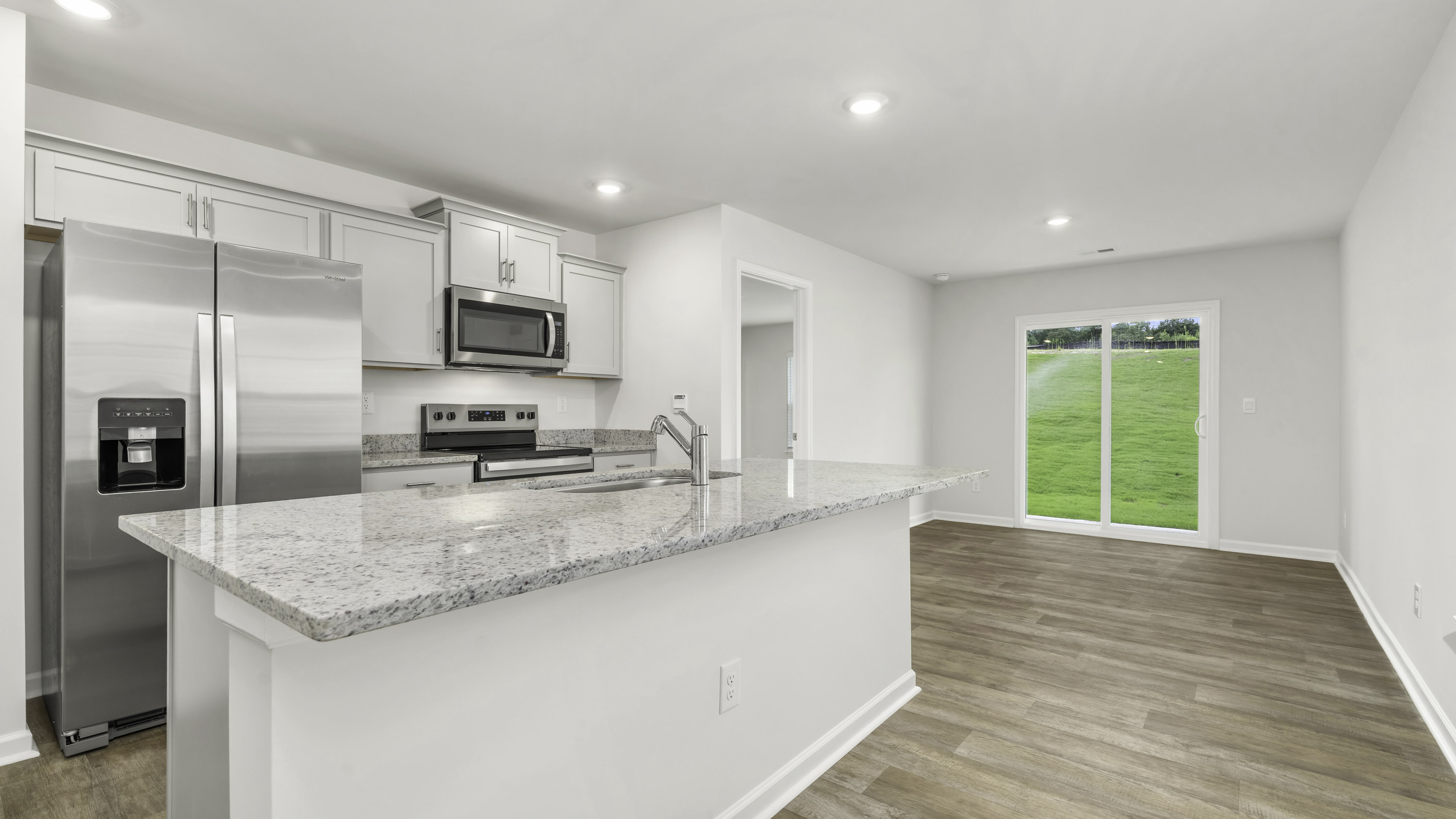 side kitchen view and dining area