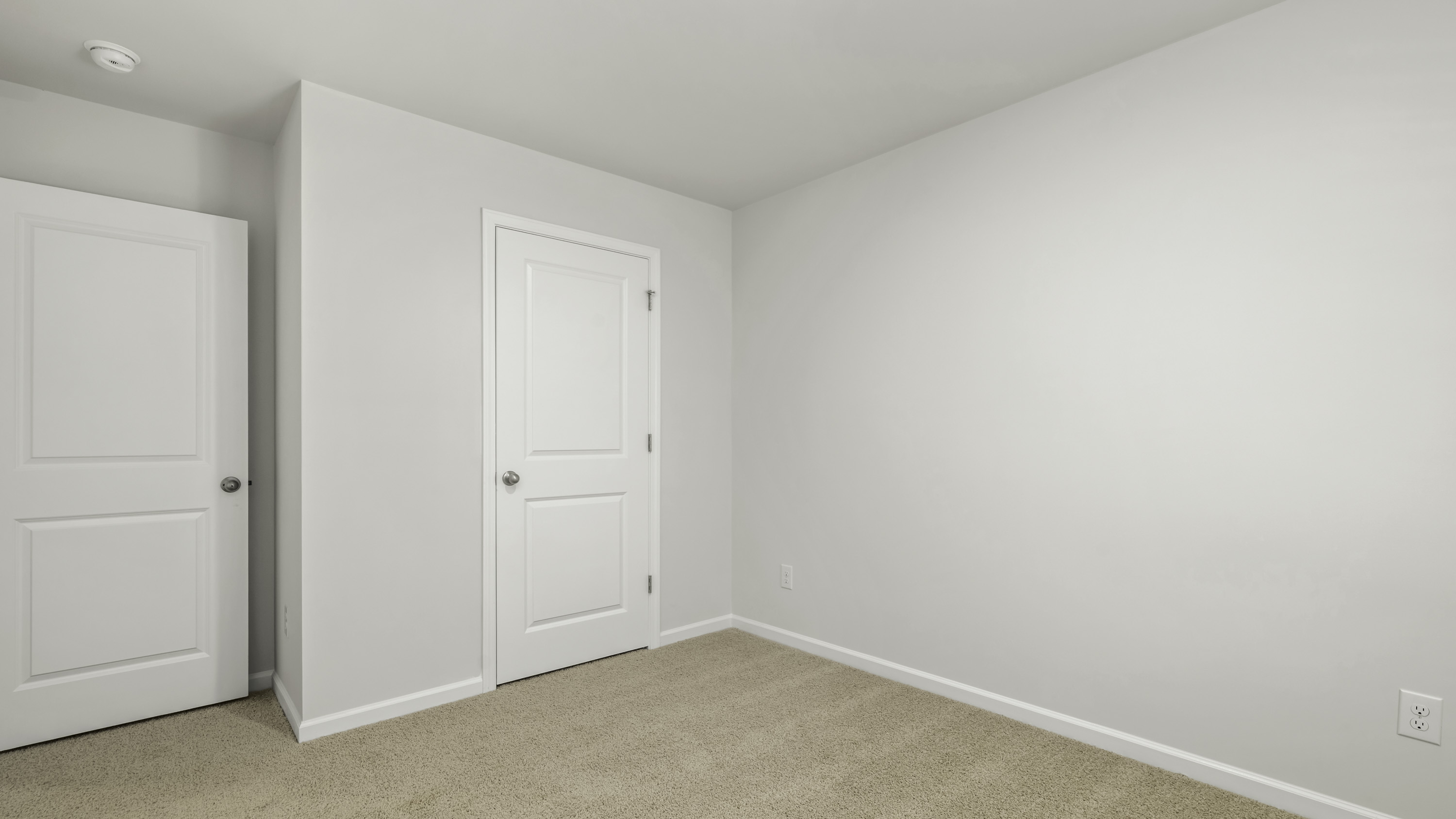 secondary bedroom with closet