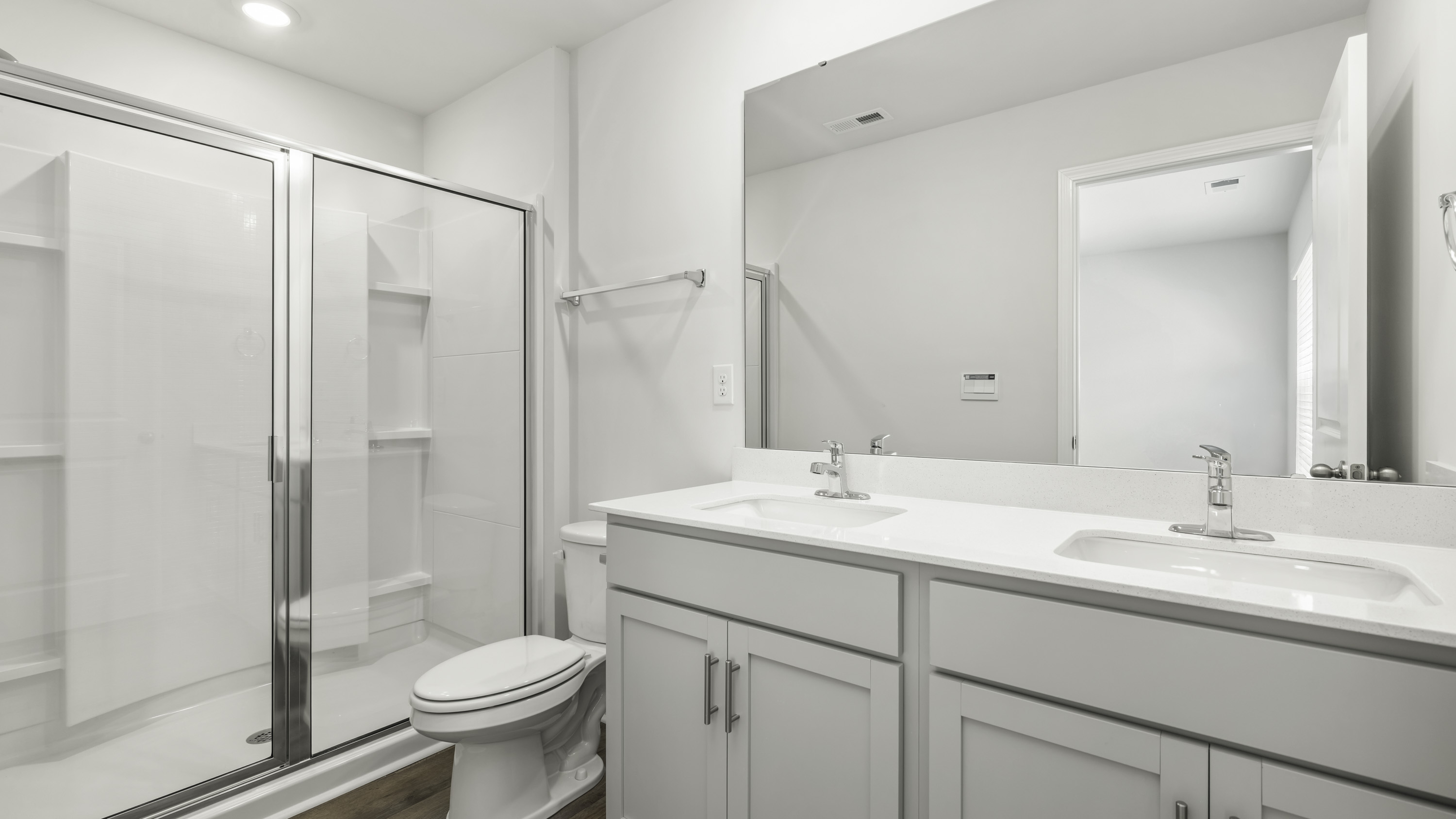 primary bathroom with walk in shower