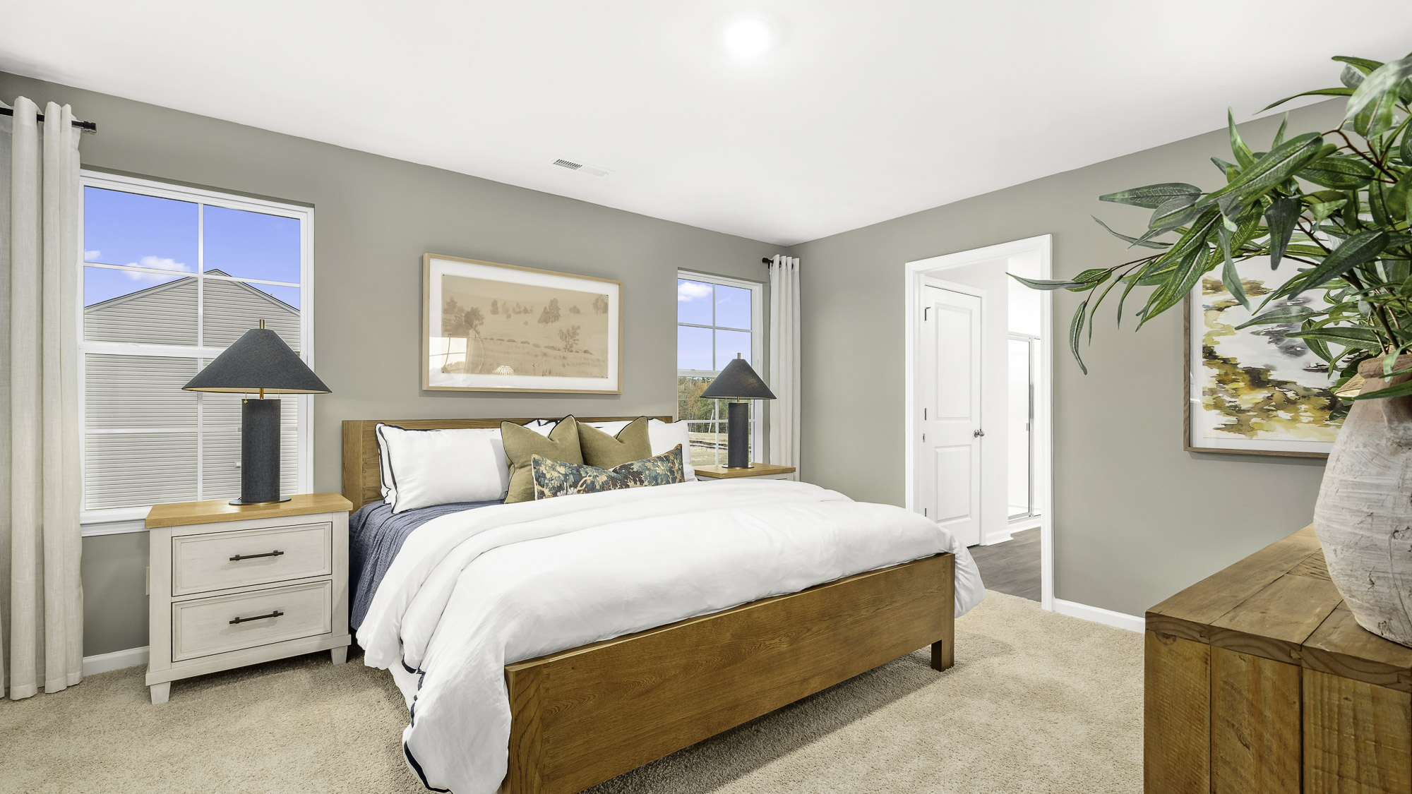 primary bedroom with windows