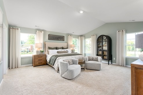 bedroom with carpet and natural light