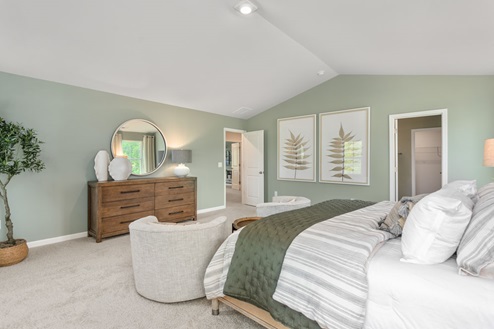 bedroom with carpet and natural light