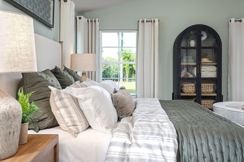 bedroom with carpet and natural light