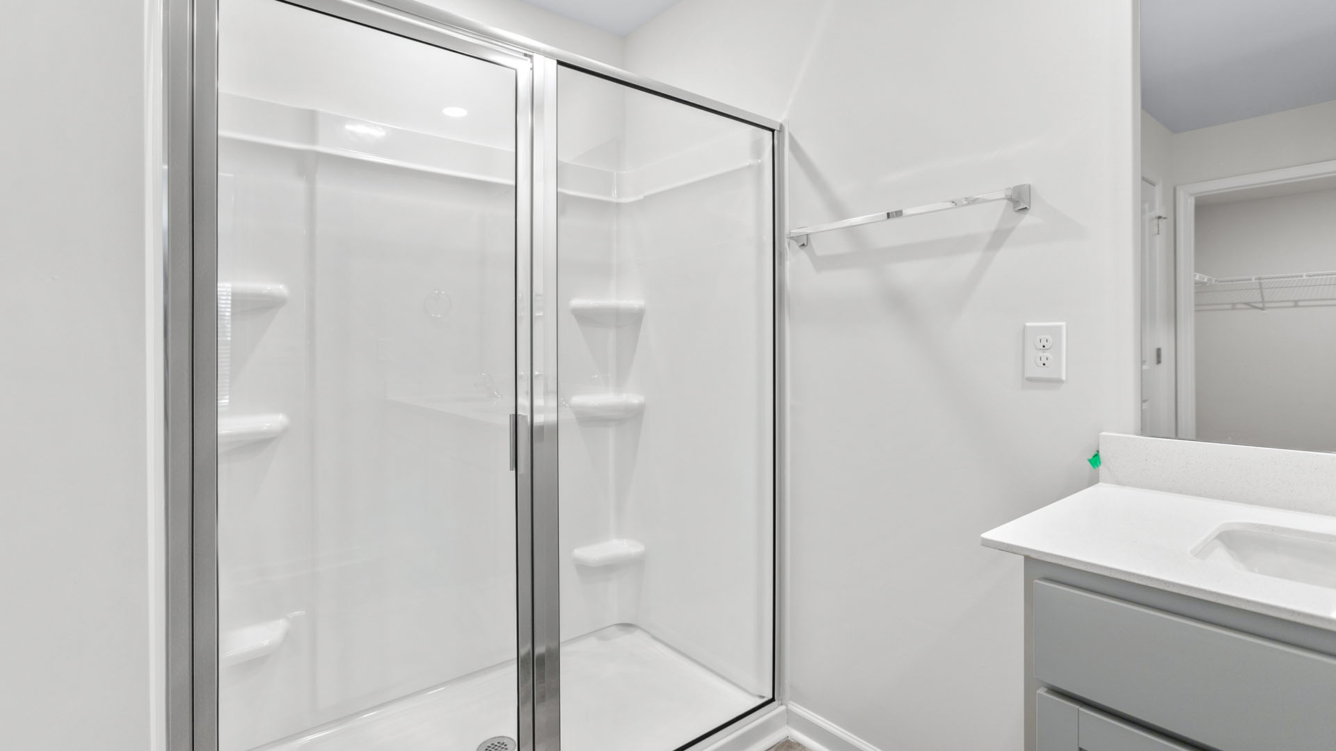 bathroom with a walk in shower