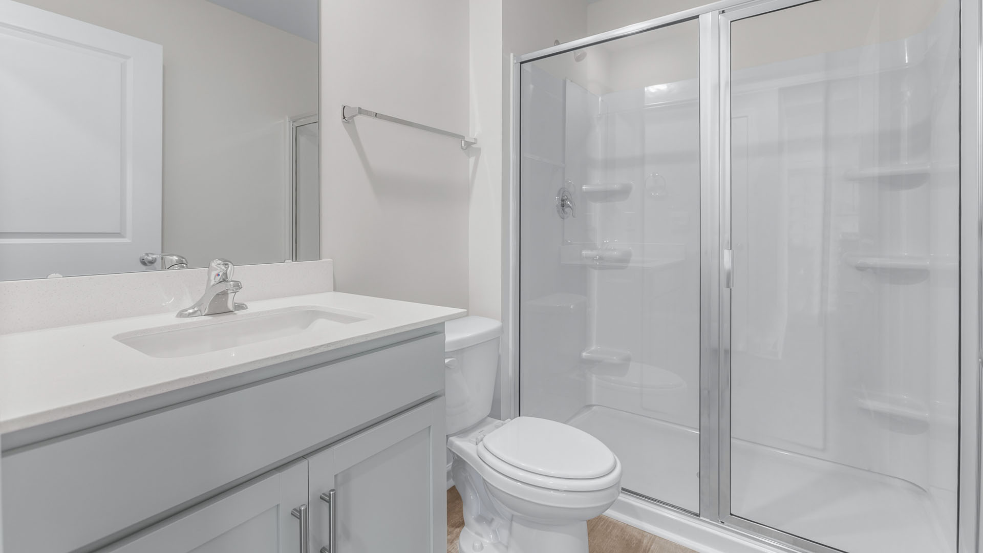 bathroom with a walk in shower