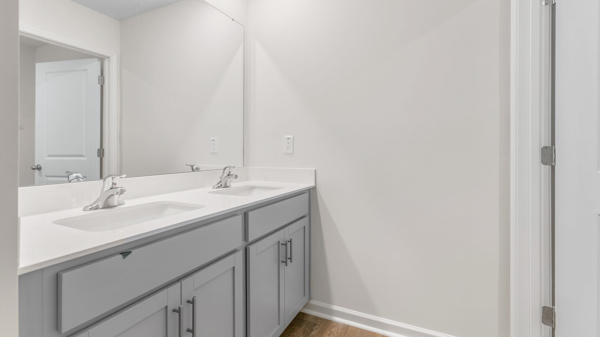 bathroom with dual sinks