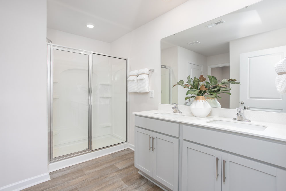 primary bathroom with walk in shower