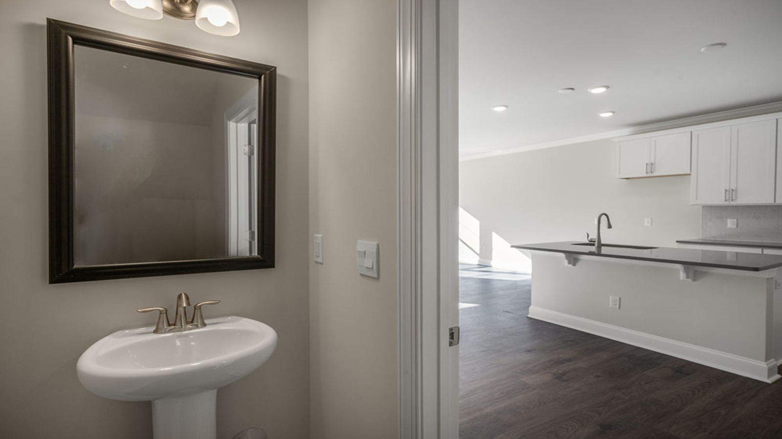 view of kitchen from bathroom