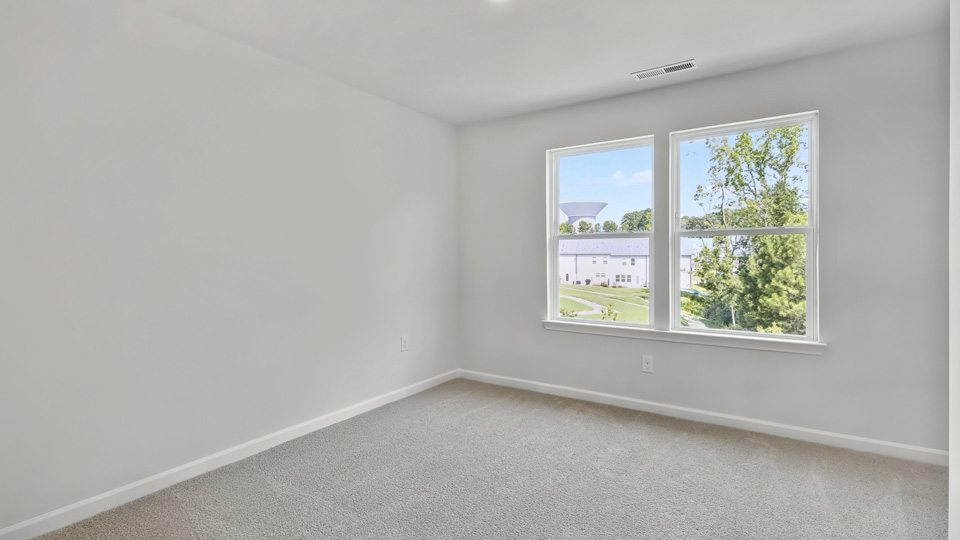 secondary with windows and carpet