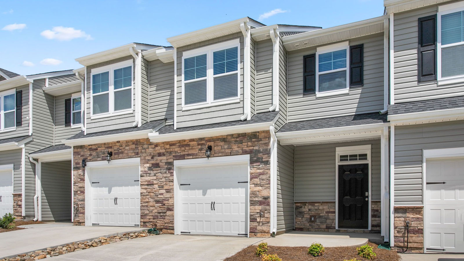 THE LANSING 2 STORY 1 CAR GARAGE 3 BED 2.5 BATH  TOWNHOME