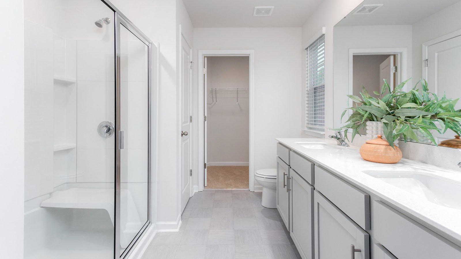 primary bathroom with walk in shower
