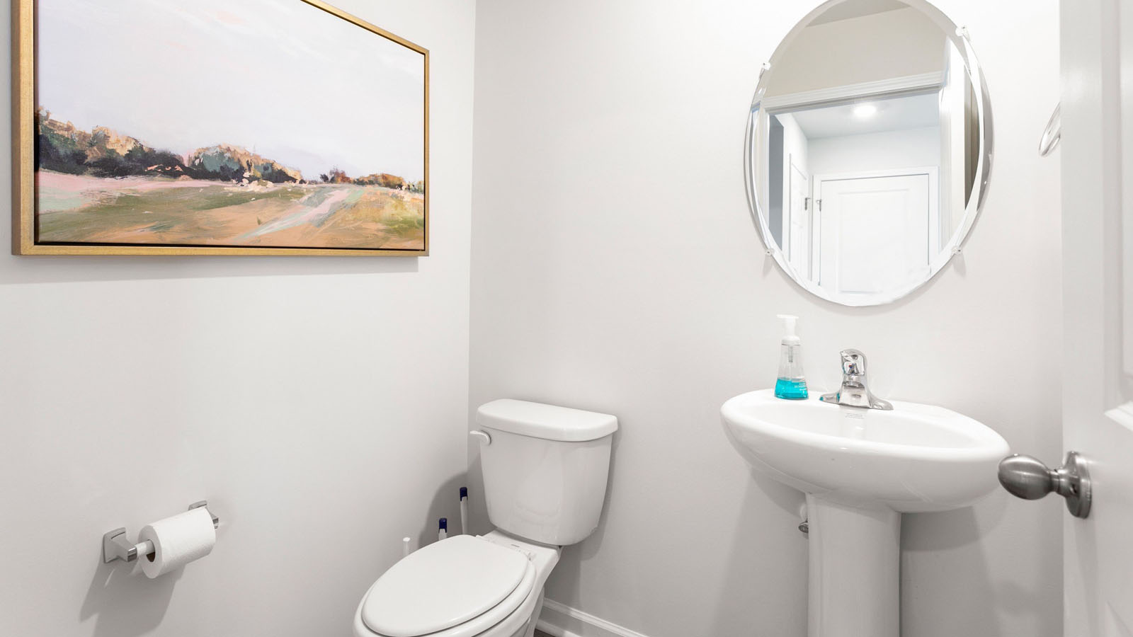 half bathroom off entryway