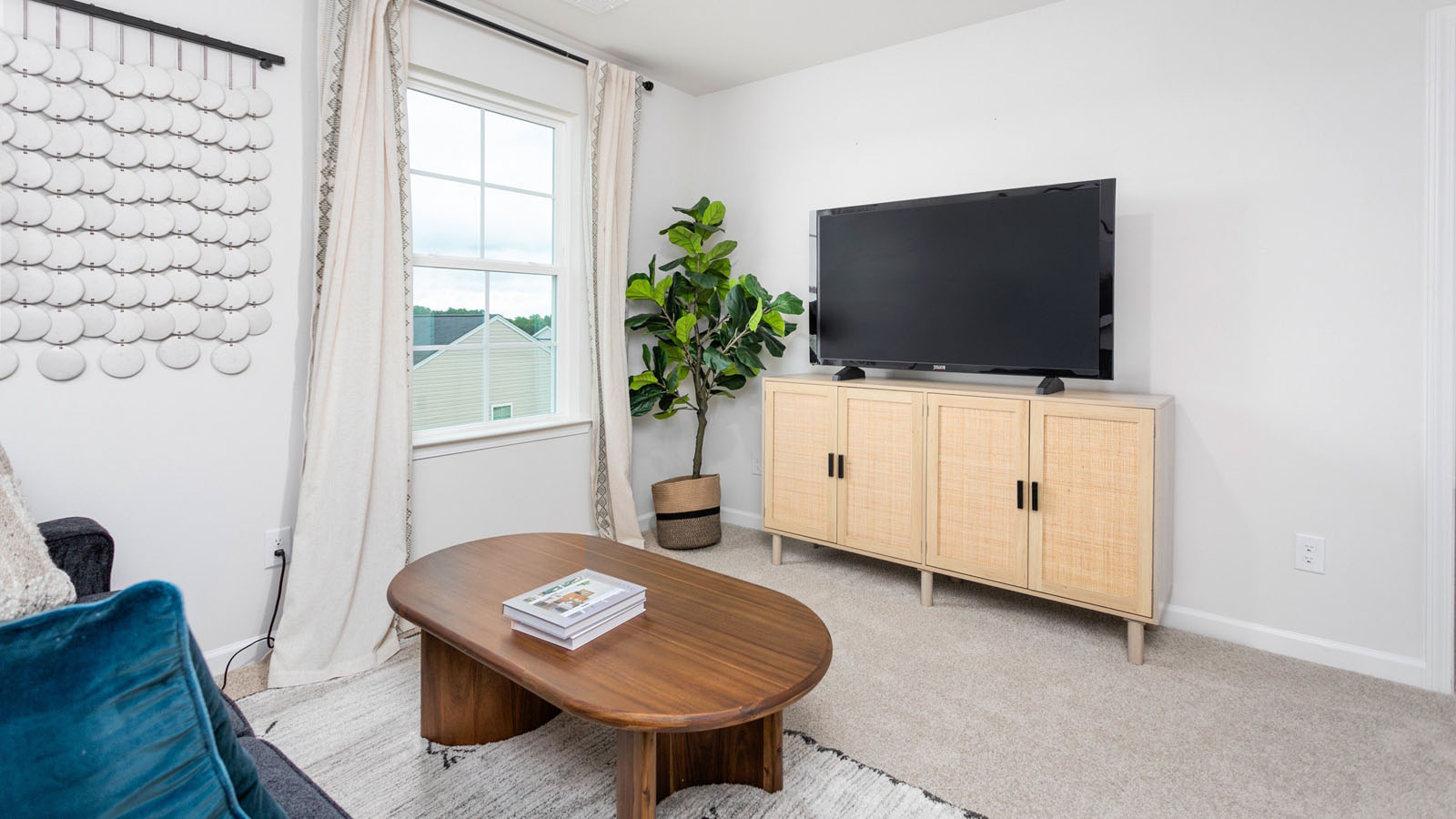 loft with carpet and window
