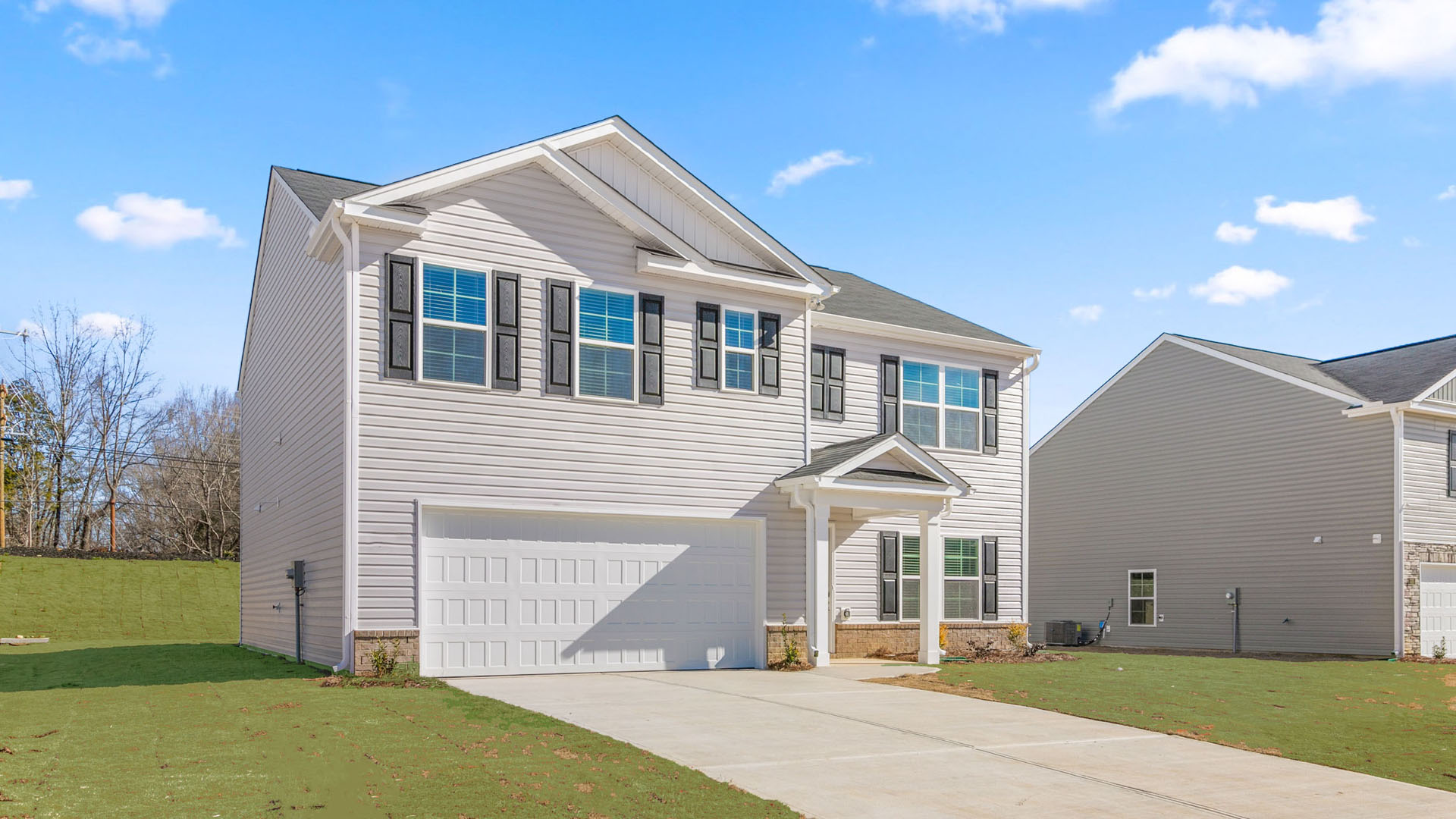Two-story home with an attached garage