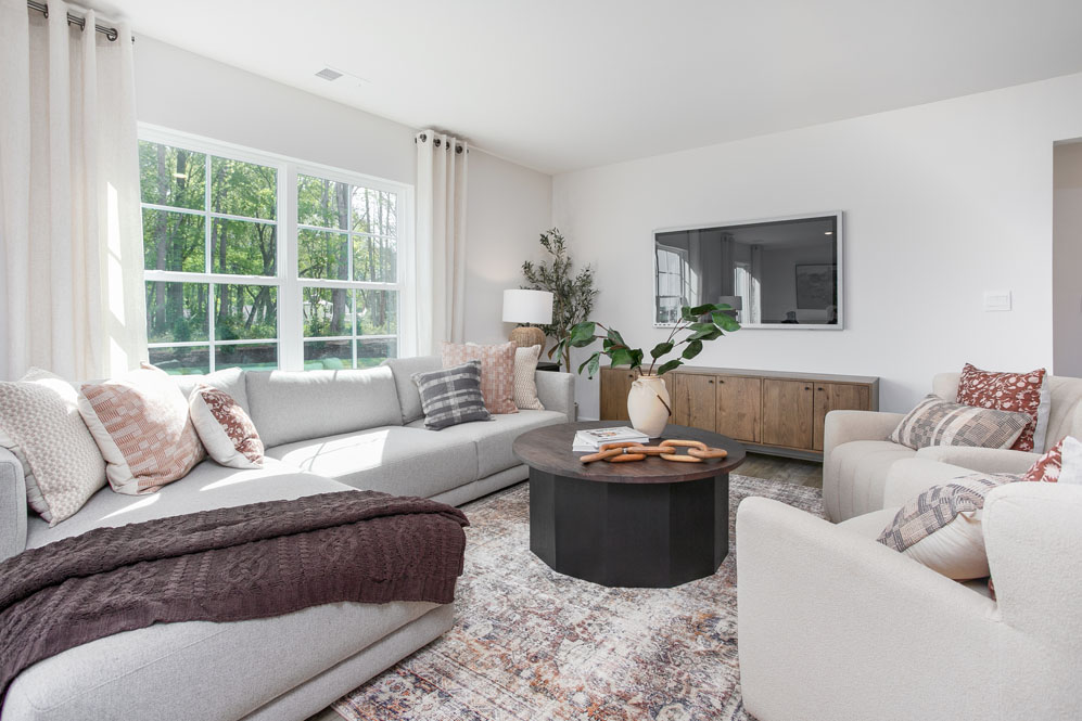 living room with vinal floor and natural light