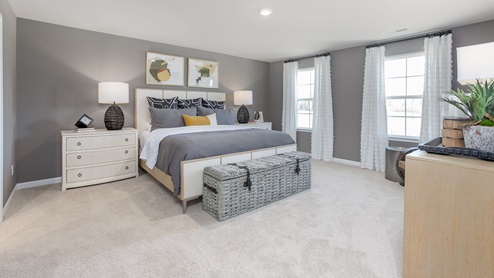bedroom with carpet and natural light