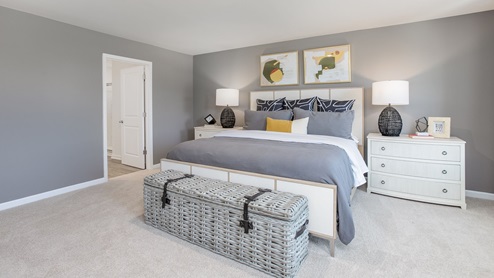 bedroom with carpet and natural light