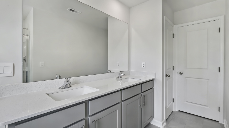 primary bathroom with tub shower combo