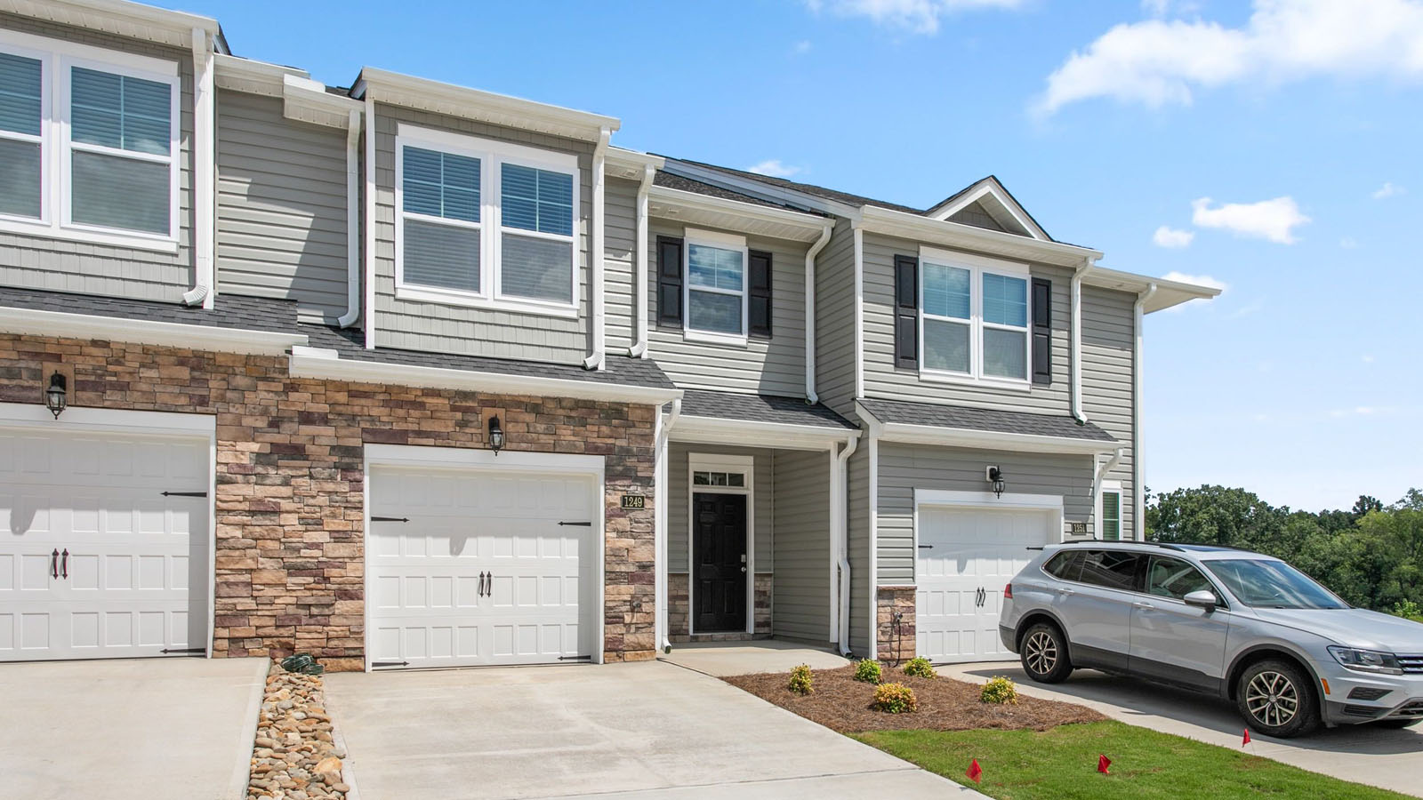 Two-story townhome with an attached garage