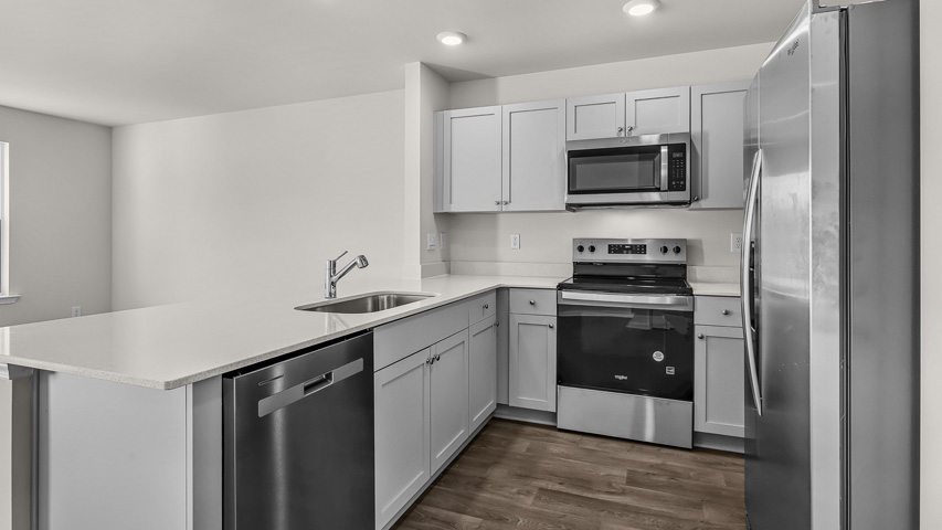 gray cabinets and granite counter top