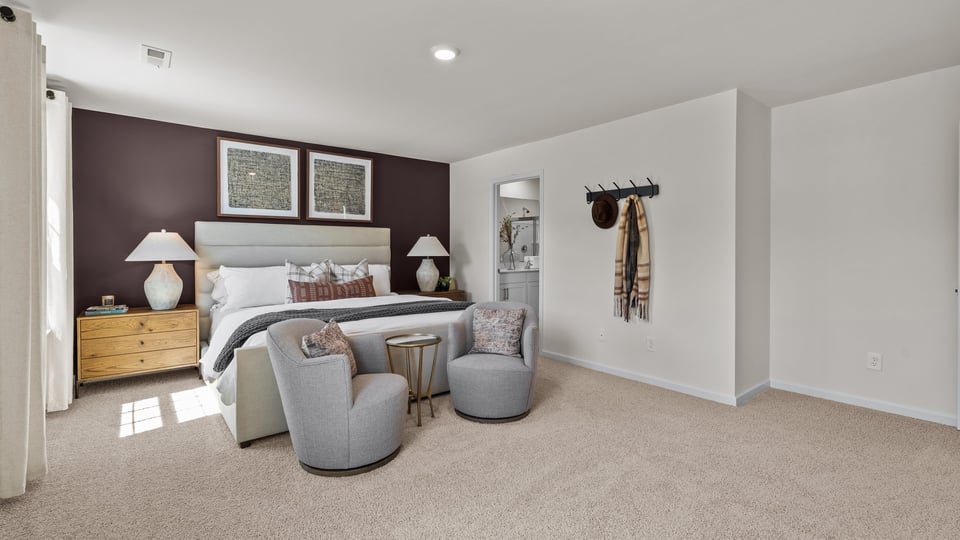 primary bedroom with carpet