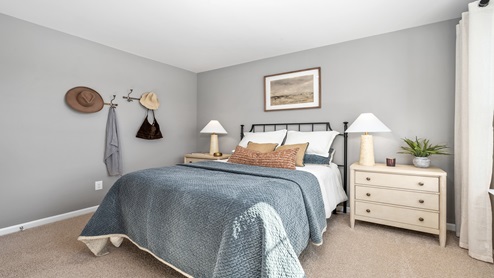 guest bedroom with carpet