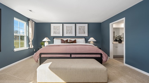 primary bedroom with carpet
