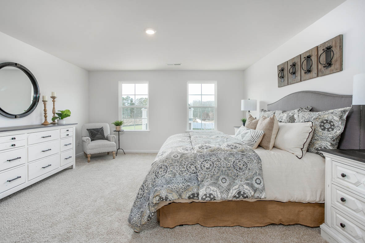 bedroom with carpet and natural light