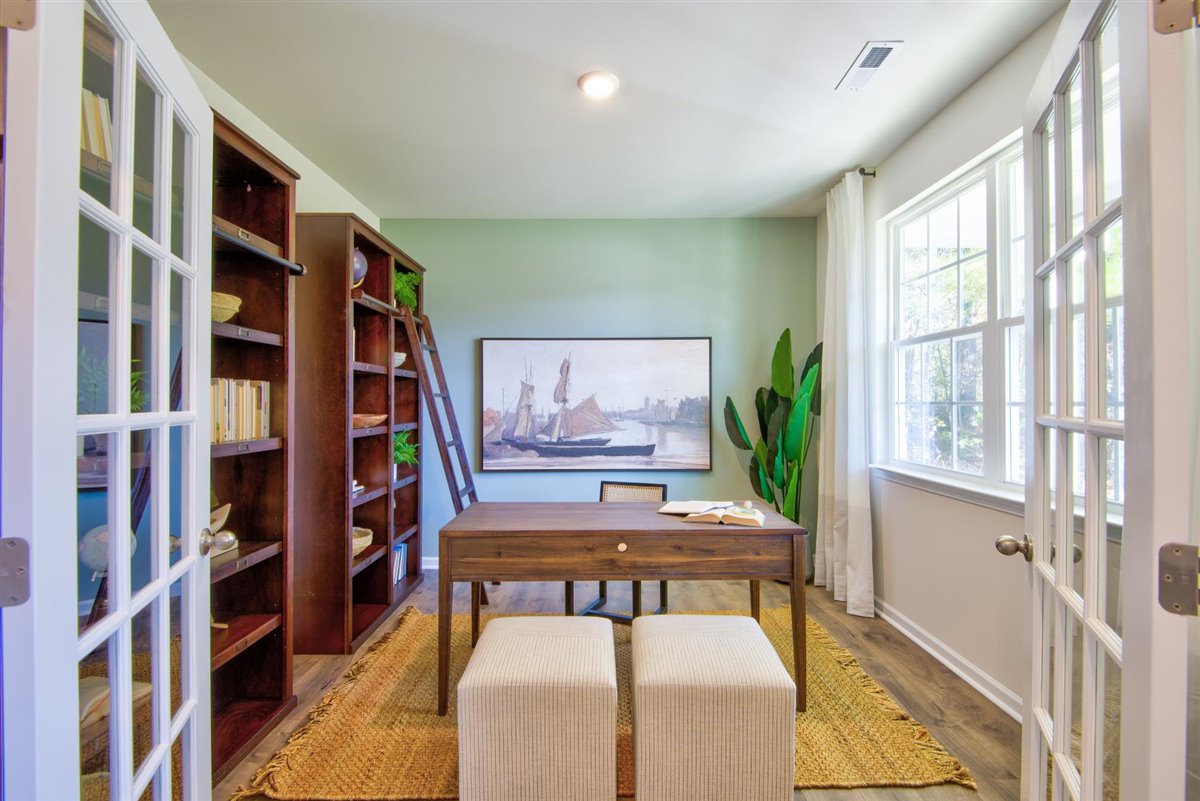 foyer with vinyl floor and french door