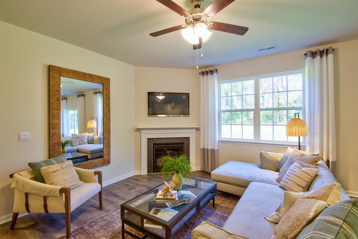 living room with vinyl floor and natural light