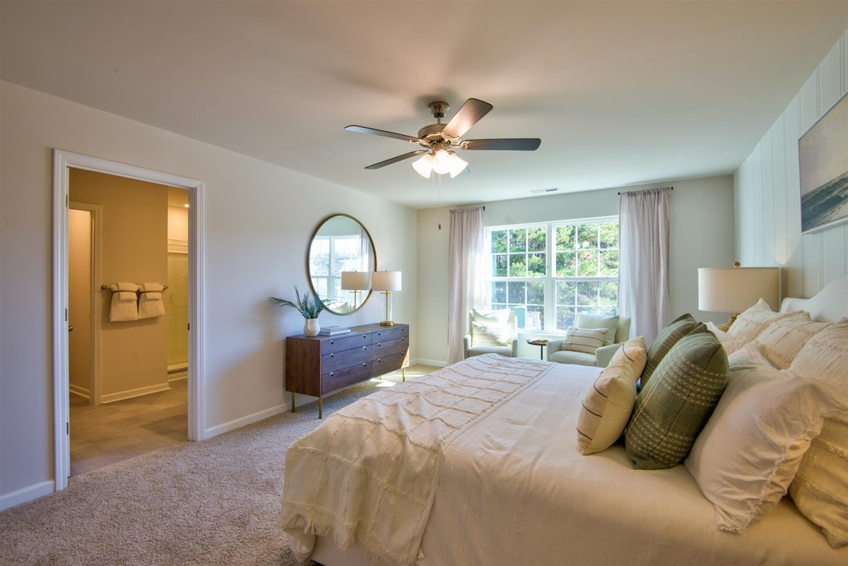 bedroom with carpet and natural light