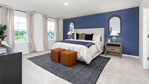 bedroom with carpet and ample light