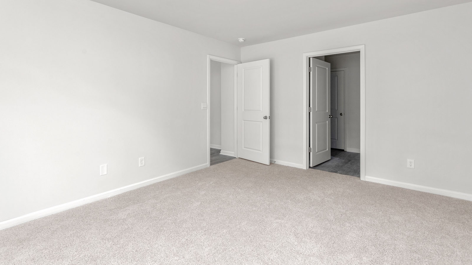 primary bedroom with carpet